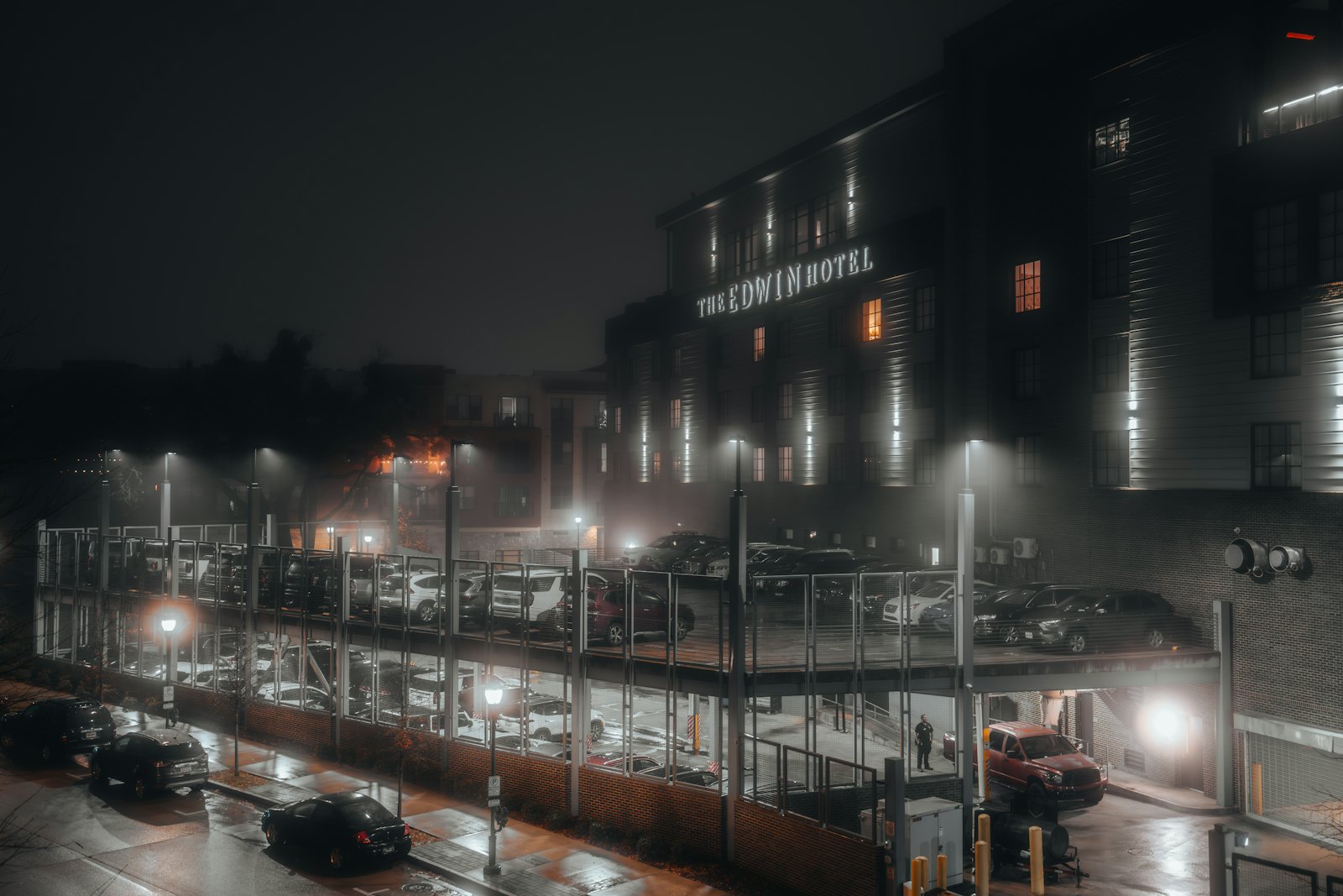 A hotel parking garage at night